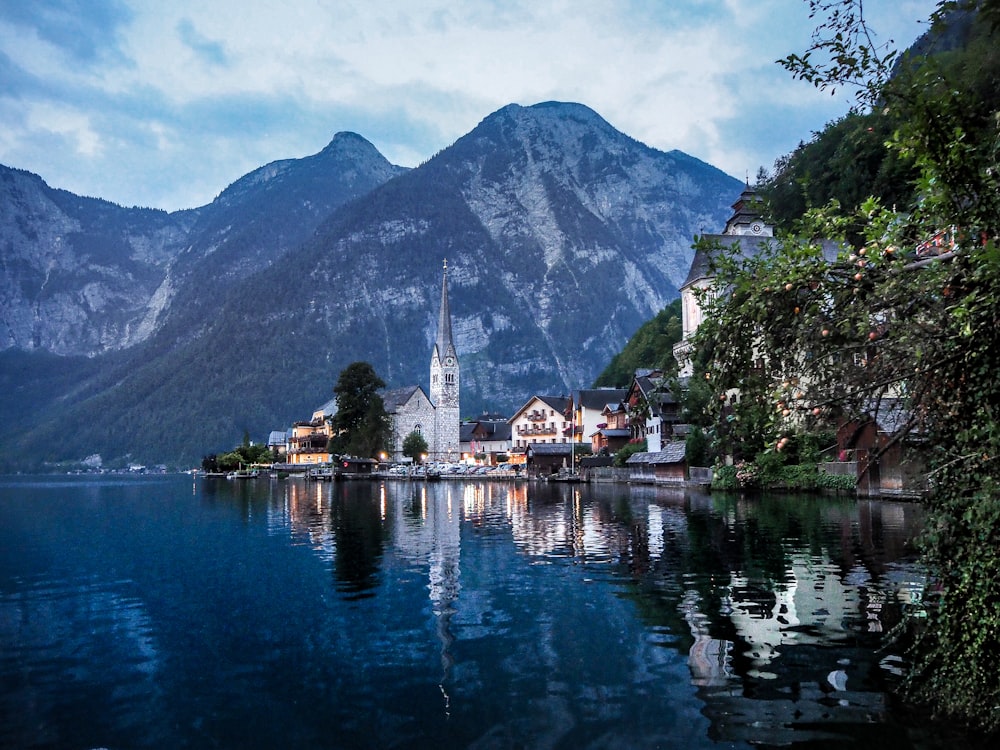 white church near body of water