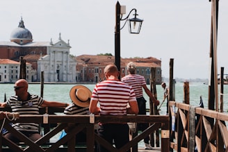 gondoliers resting under clear sky