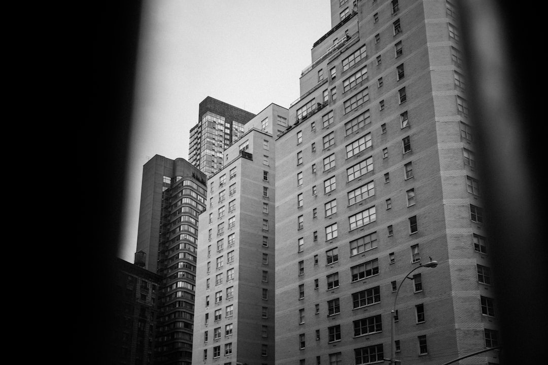 greyscale photo of buildings