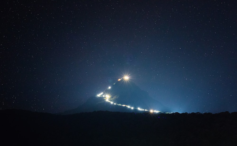 white and black mountain during nighttime