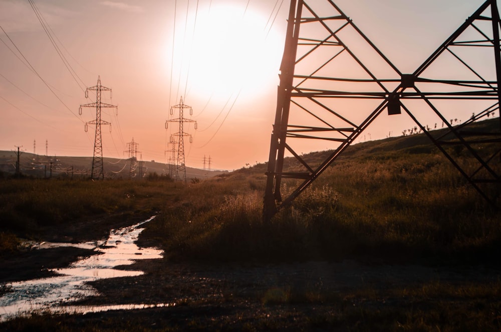 silhouette of electric towers