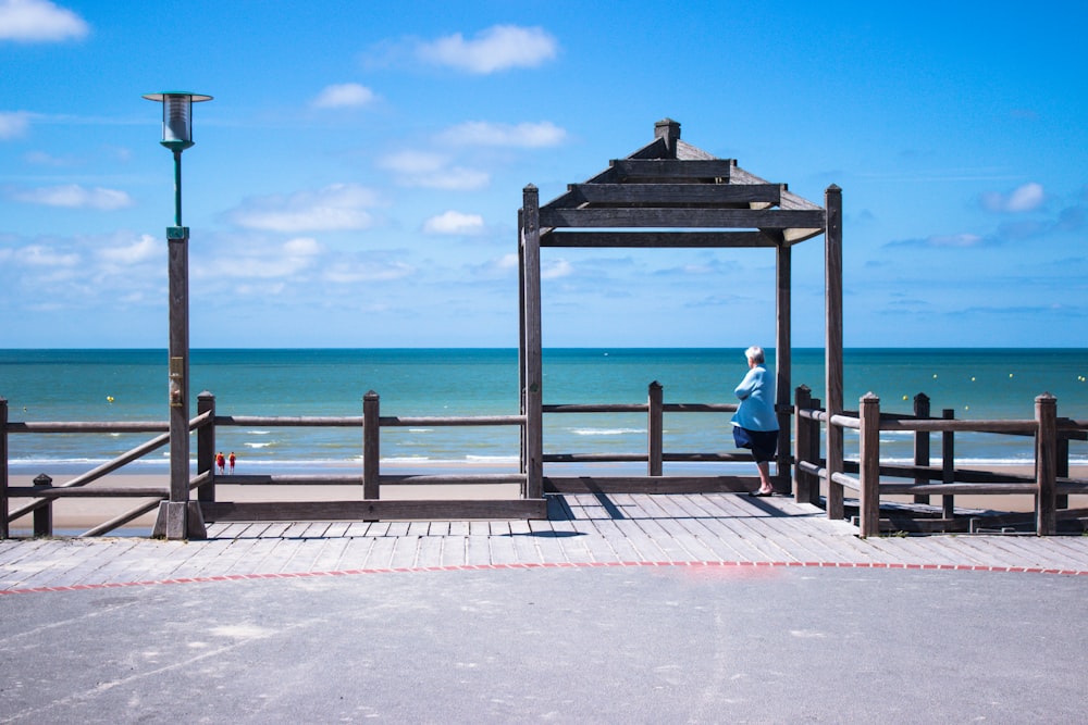 person standing near sea