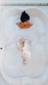 person taking bubble bath - bubble bath day - January 8