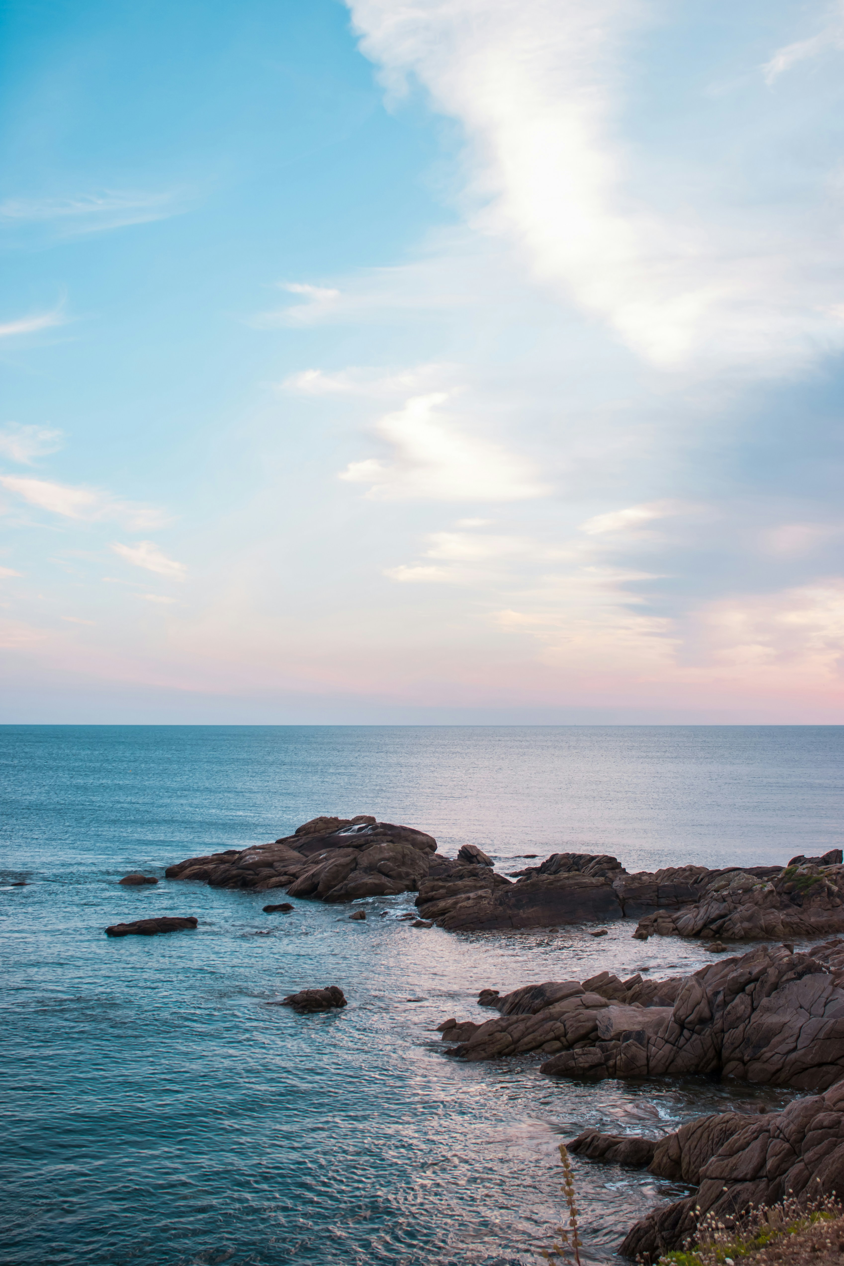 White And Blue Cloudy Sky Over The Sea Photo Free Nature Image On Unsplash