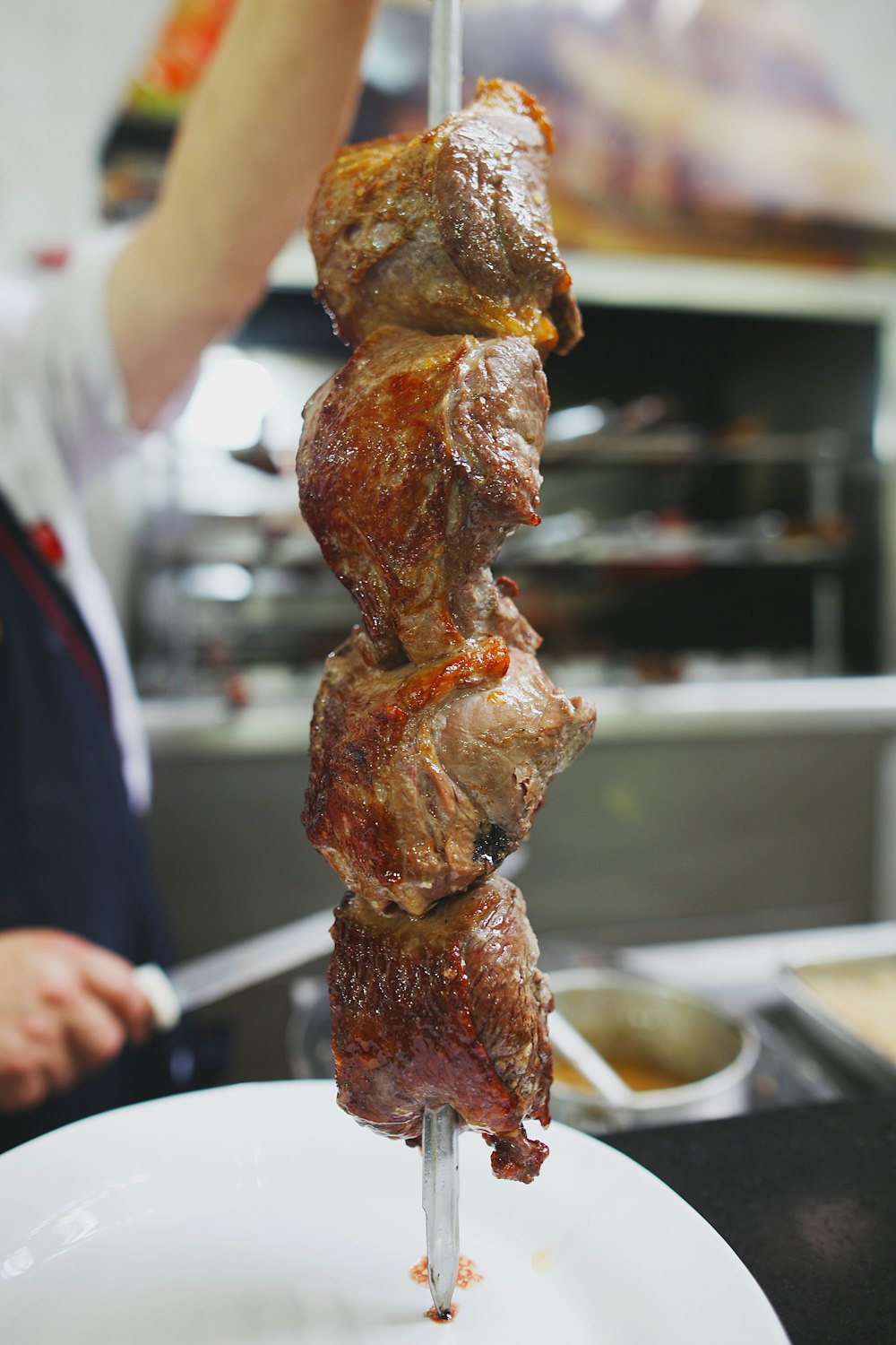 chicken barbecue on a metal stick