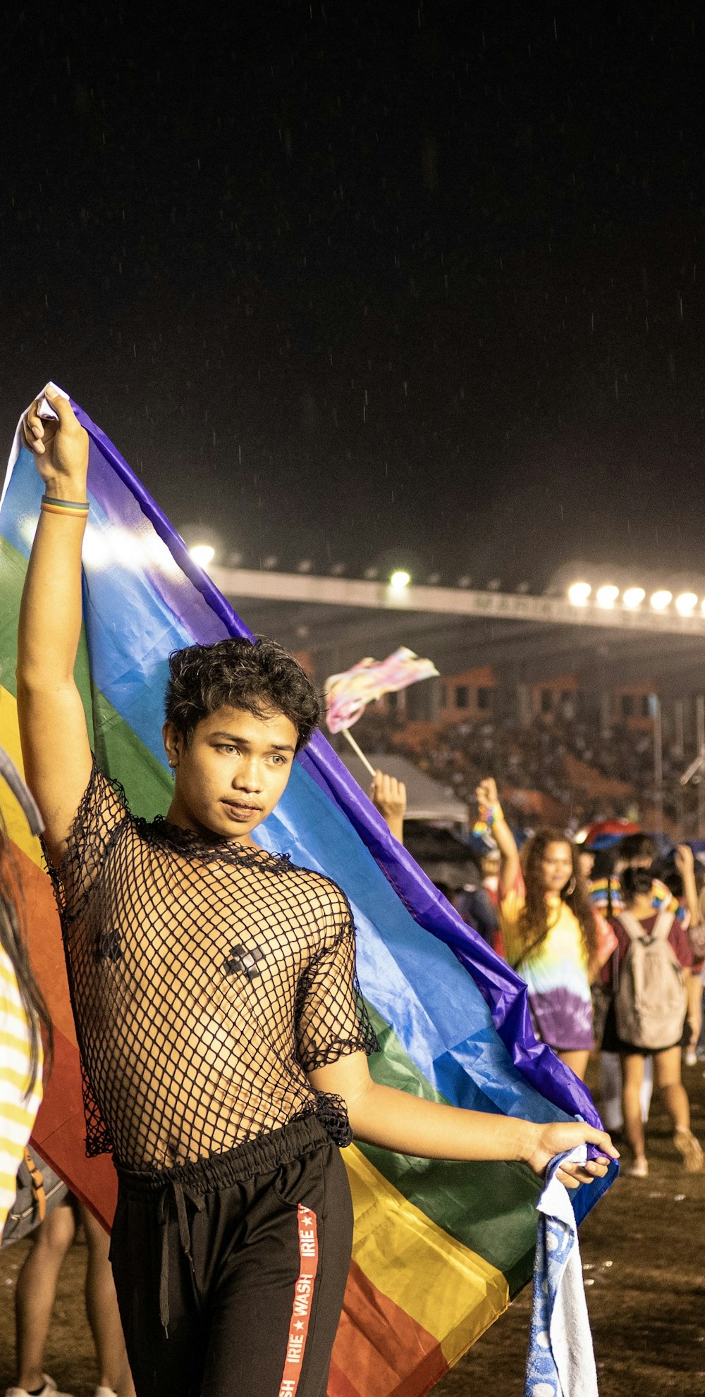 man in black mesh top