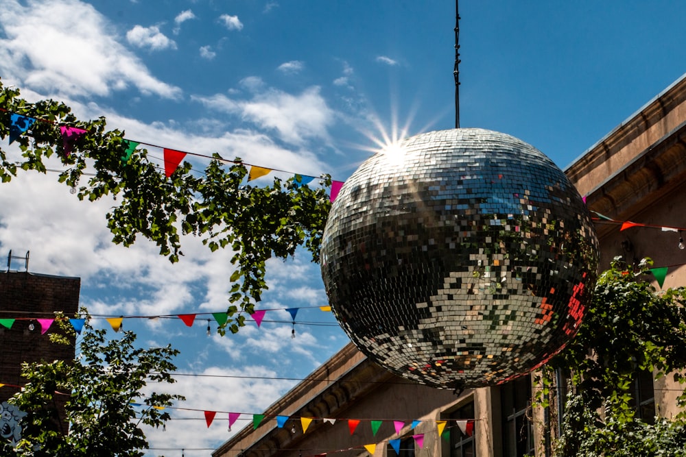 silver-colored and white disco ball