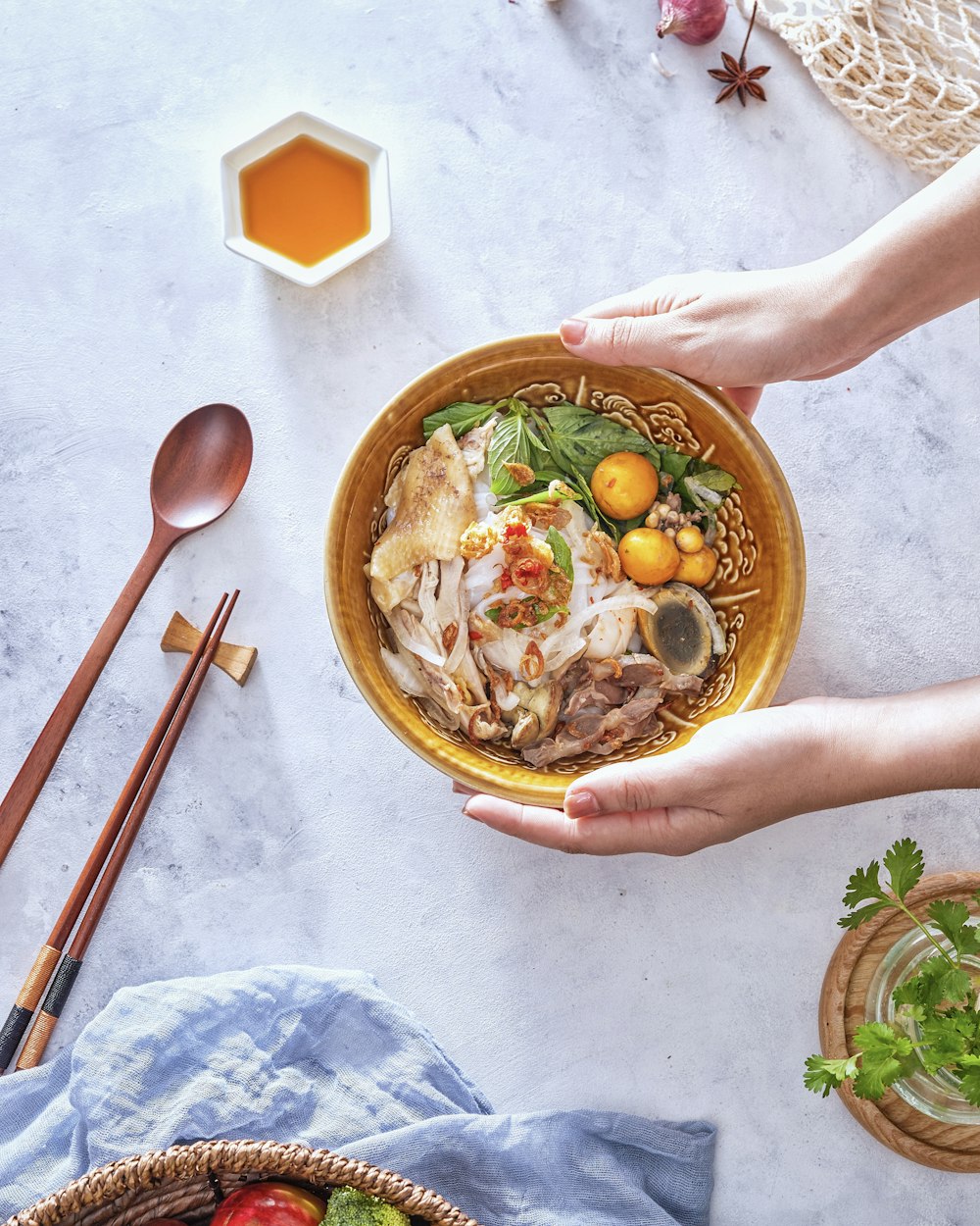 ramen in brown ceramic bowl