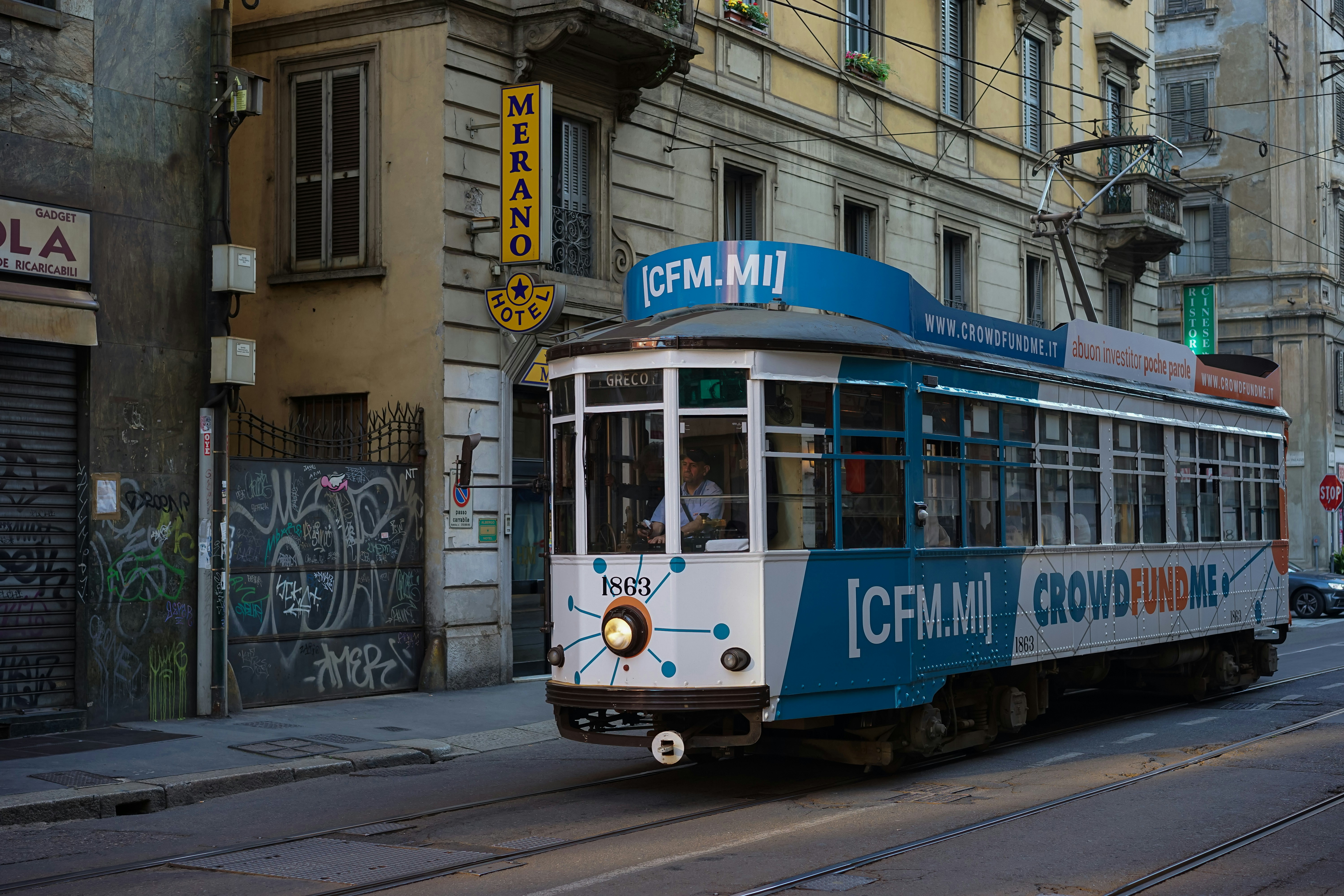 white and blue train close-up photography