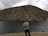 man standing near lake