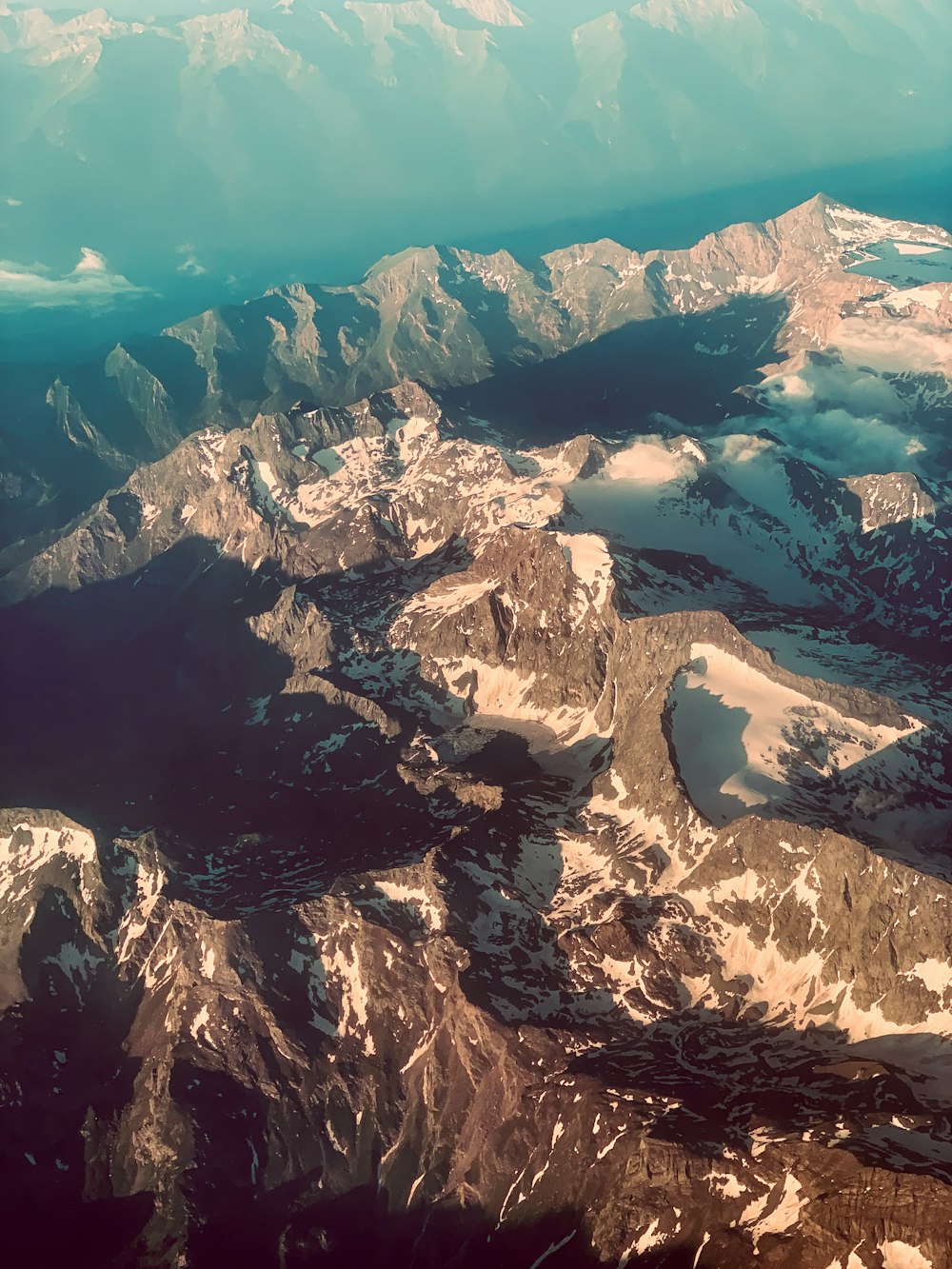 snow-covered mountain at daytime