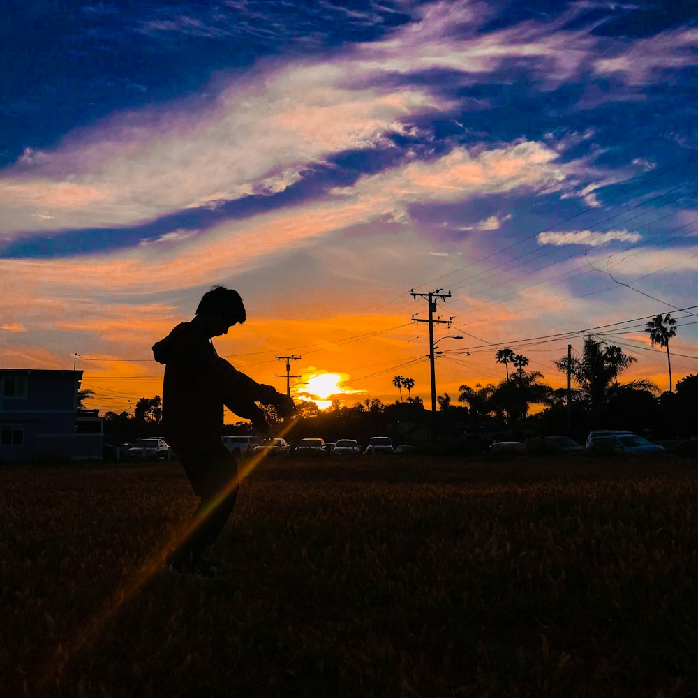 silhouette of boy