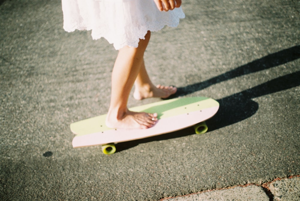 woman riding on cruiser board