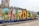 Large colorful letters spelling 'Cardenas' are displayed in a public area, each letter painted with vibrant, detailed scenes depicting various aspects of culture, nature, and daily life. The base of the display features the phrase 'La puerta del sureste...' in elegant script.
