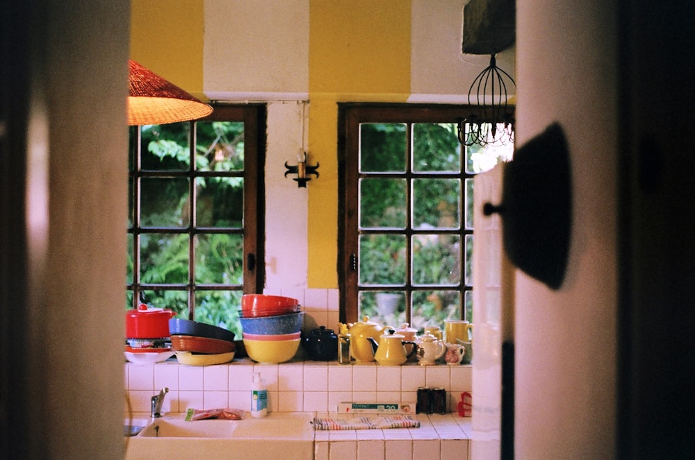 assorted-color ceramic bowls