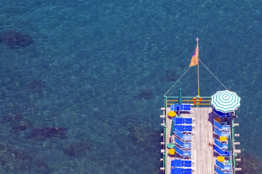 brown wooden boat on water