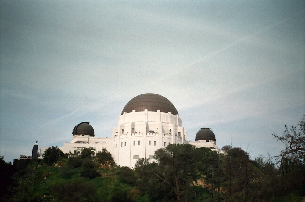 white dome building under gray sky