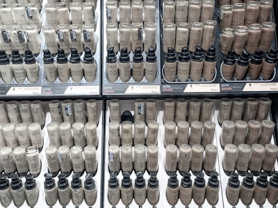 a display case filled with lots of brown and black items