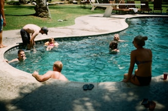 Round Rock family swimming in the pool after pool filter repair.