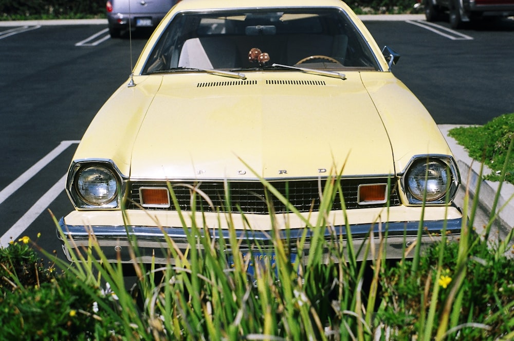 classic beige-metallic Ford vehicle