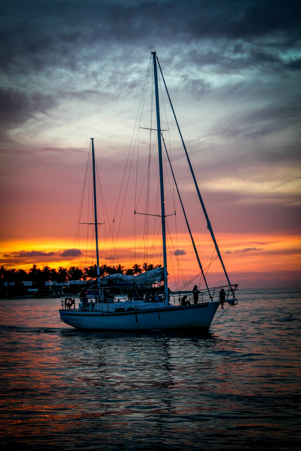 white boat during golden hour