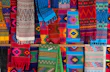 Detail of colorful Ecuadorian textiles laid out gracefully
