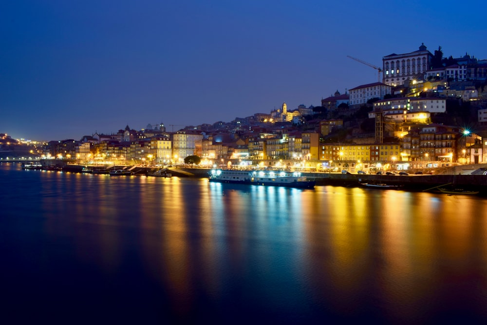 panoramic photo of lighted cityscape at night