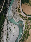 High-angle photo of a winding river cutting through Isparta's landscape.