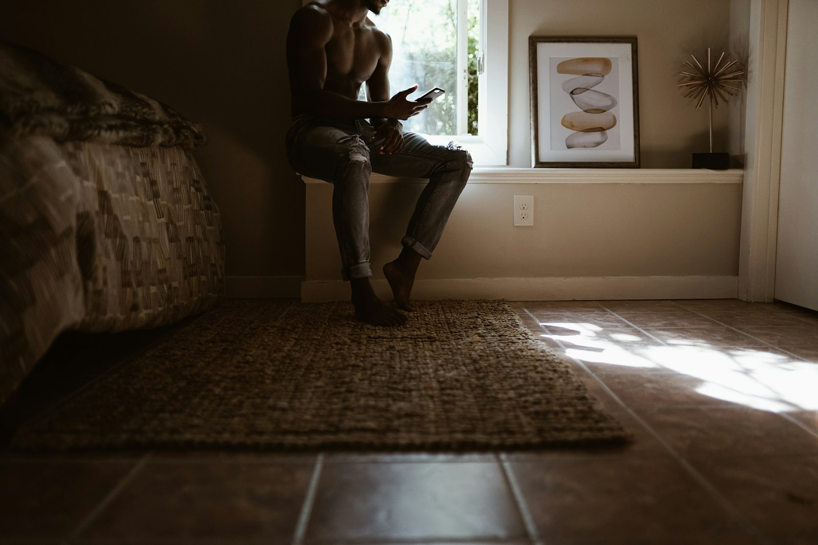 Sony a7 II + Sigma 35mm F1.4 DG HSM Art sample photo. Man sitting beside window photography