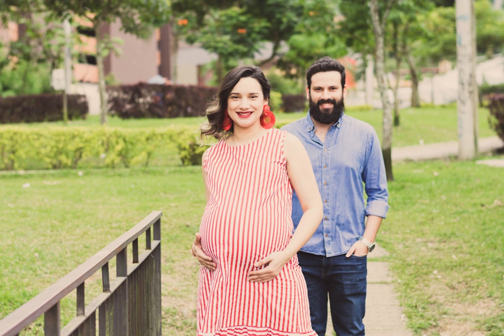 smiling man and woman near outdoor during daytime