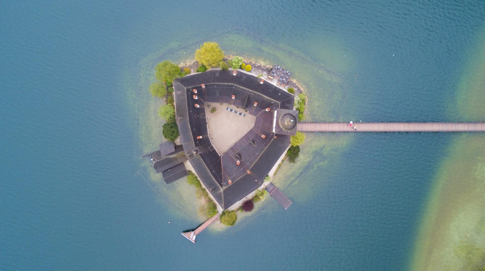 an aerial view of an island in the middle of the ocean