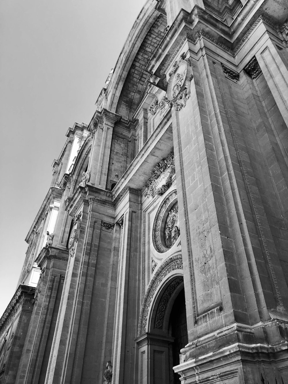 grayscale photography of concrete building