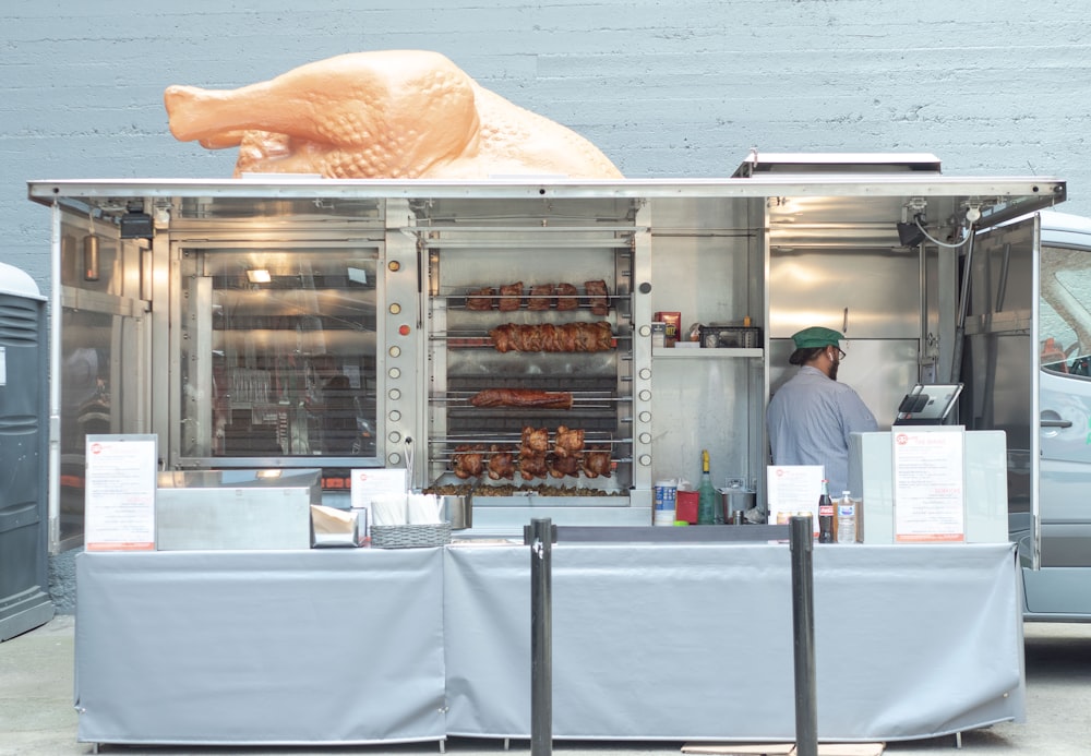 man standing in front of oven