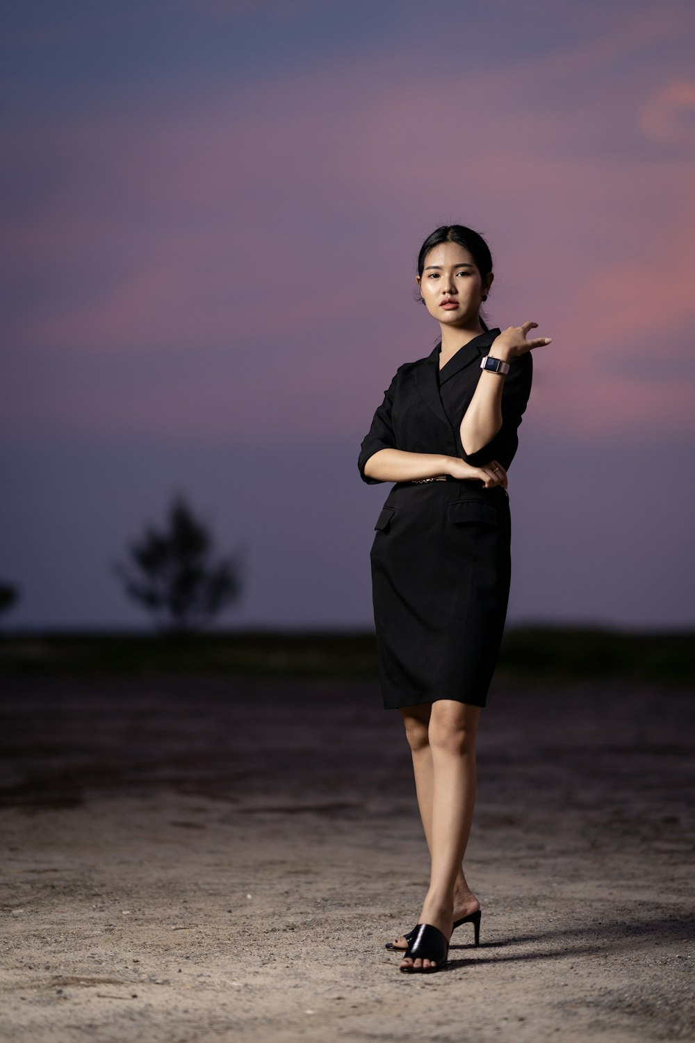 woman wearing black dress