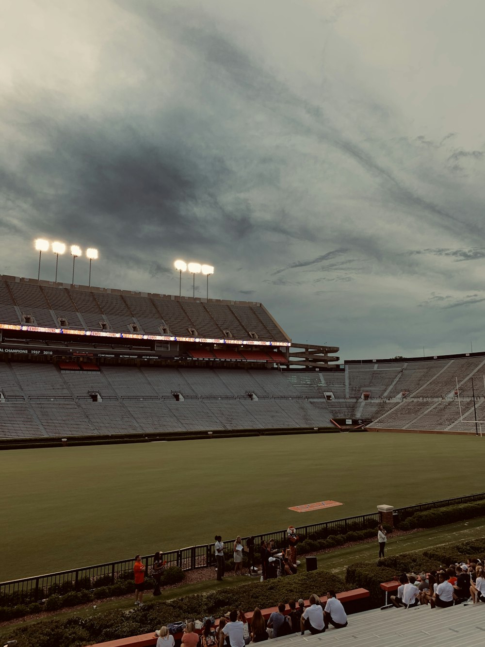 selective photography of game field under gray sky