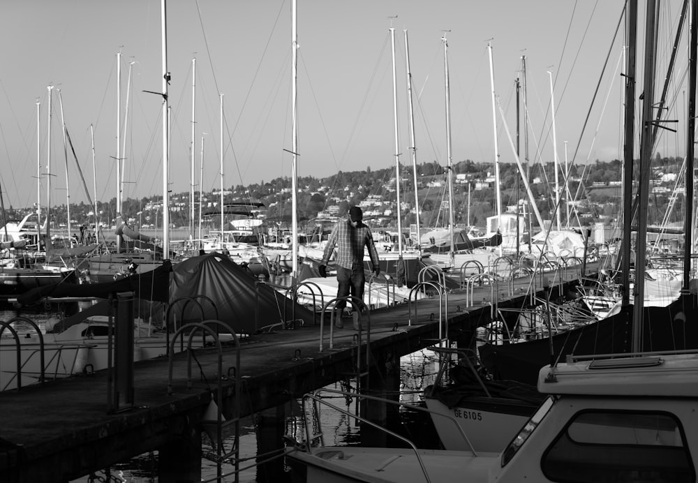 man standing on shipyard dock