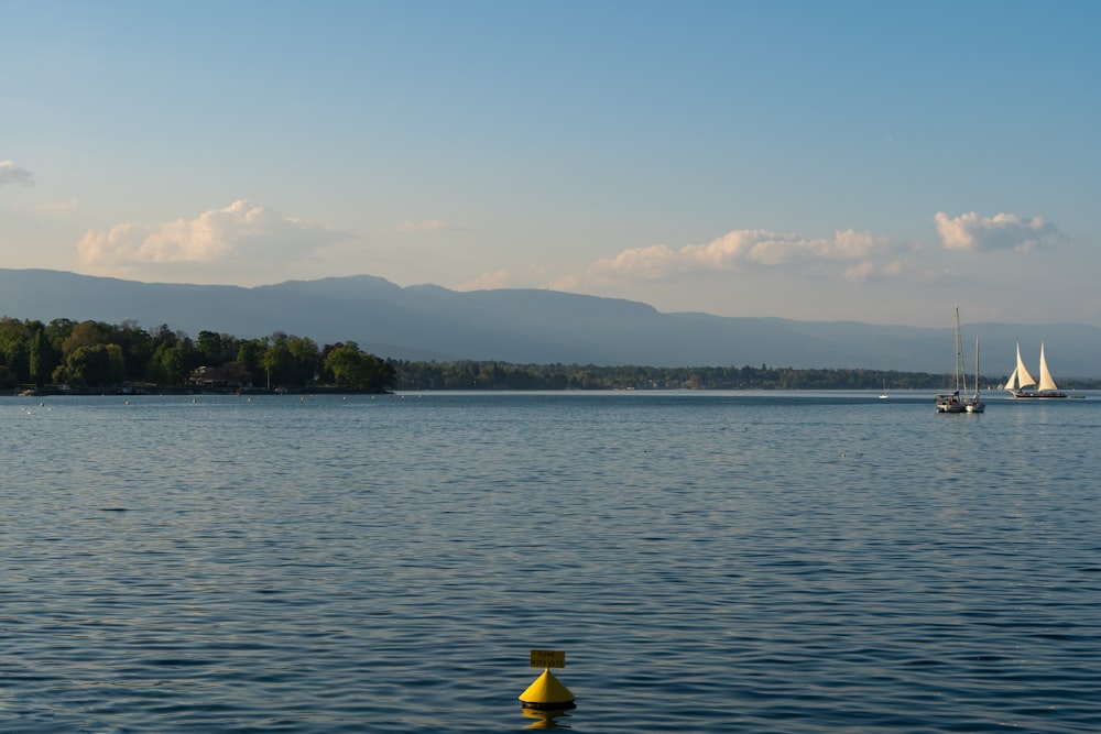 body of water under blue sky