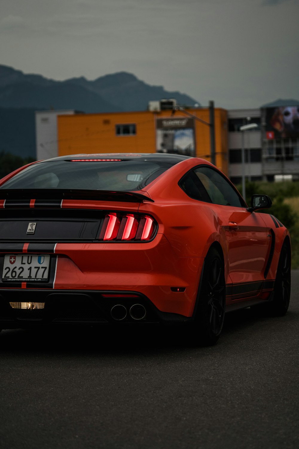 orange Ford Mustang coupe