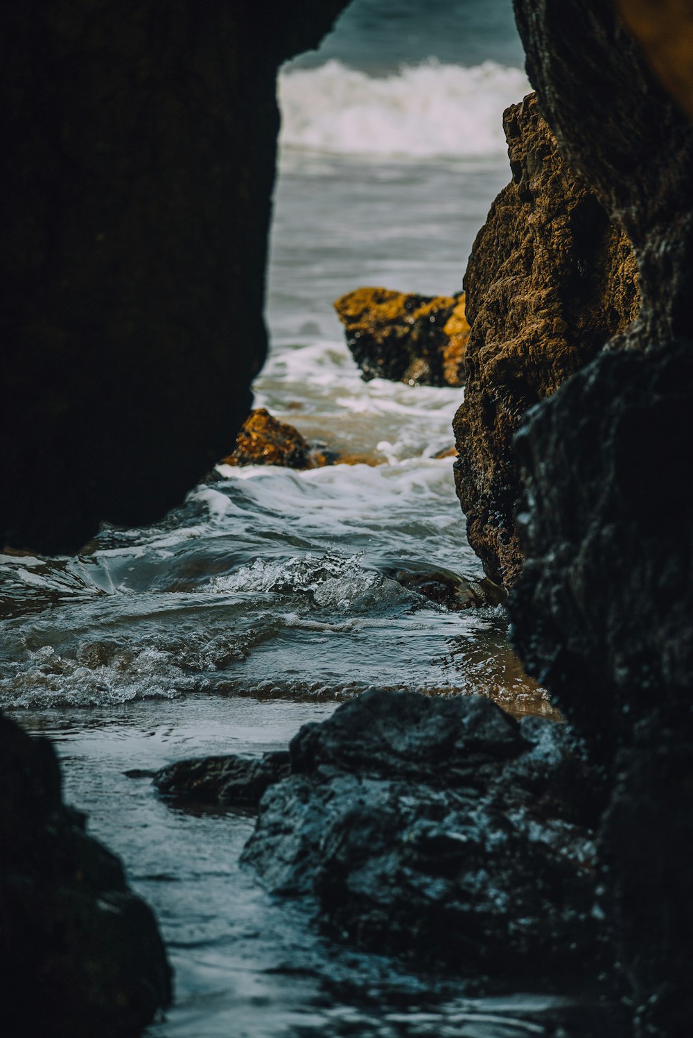 body of water between rocks