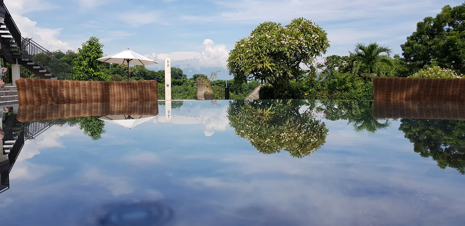 Beachfront infinity pool overlooking the ocean at a Bali resort