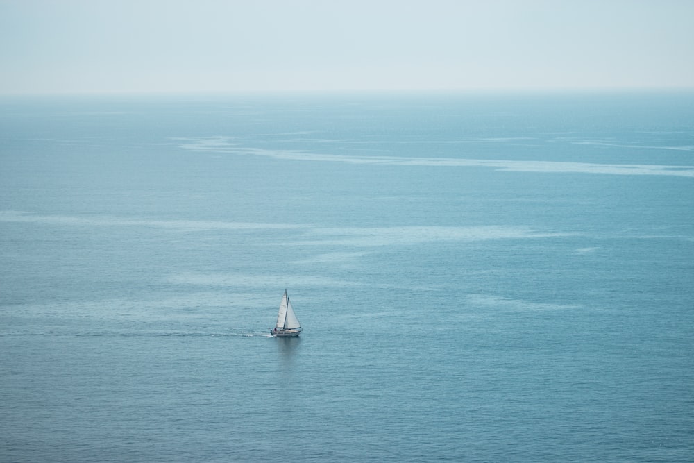 sail boat on body of water