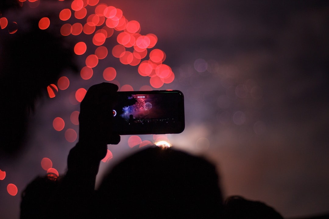 silhouette of person taking photo