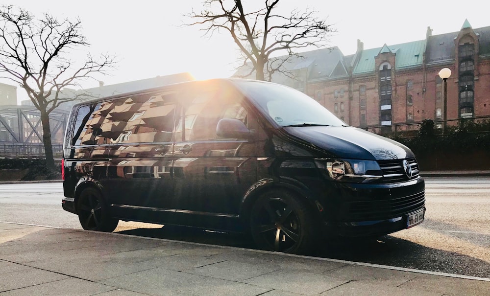 black van parked on road