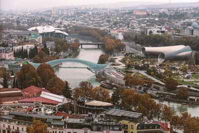 aerial photography of teal bridge during daytime georgia google meet background