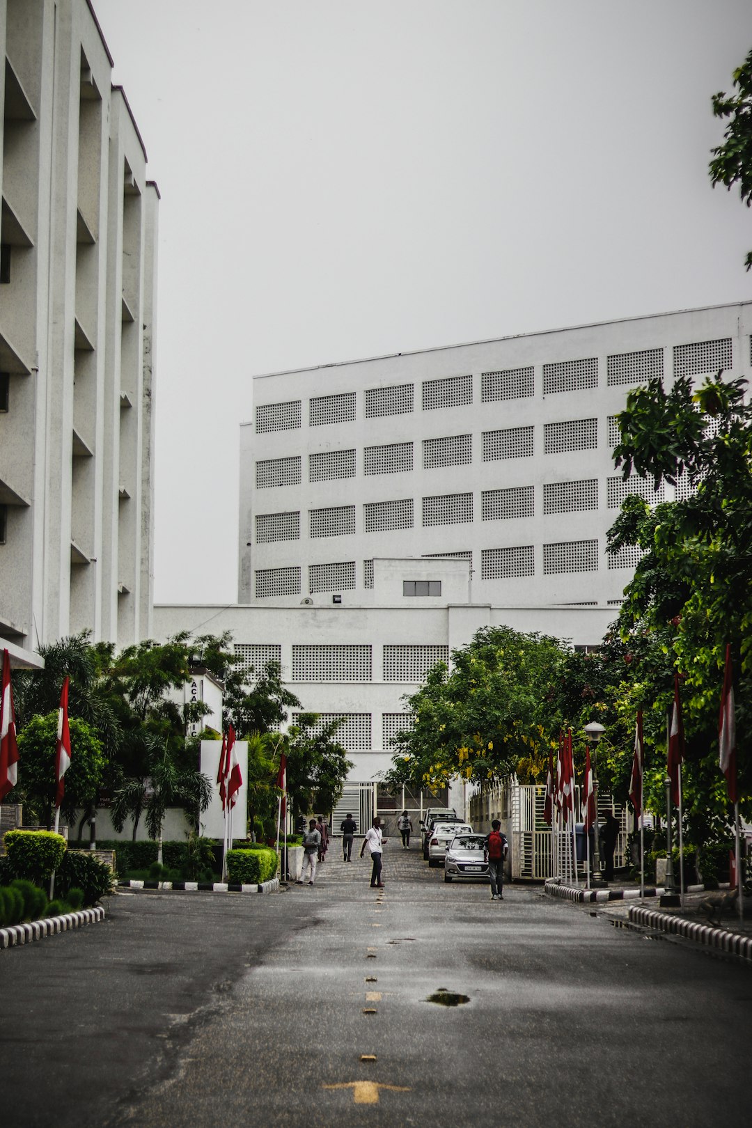 people walking in front of building