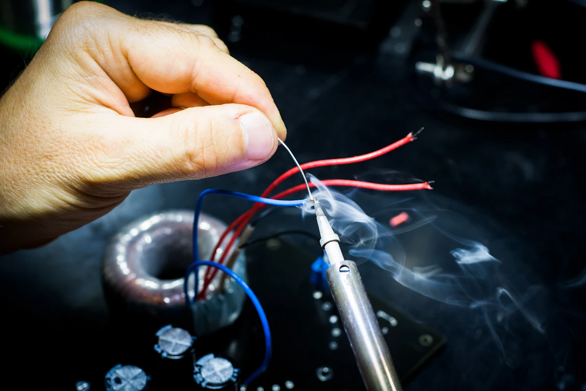 Soldering work being carried out at the repair bench