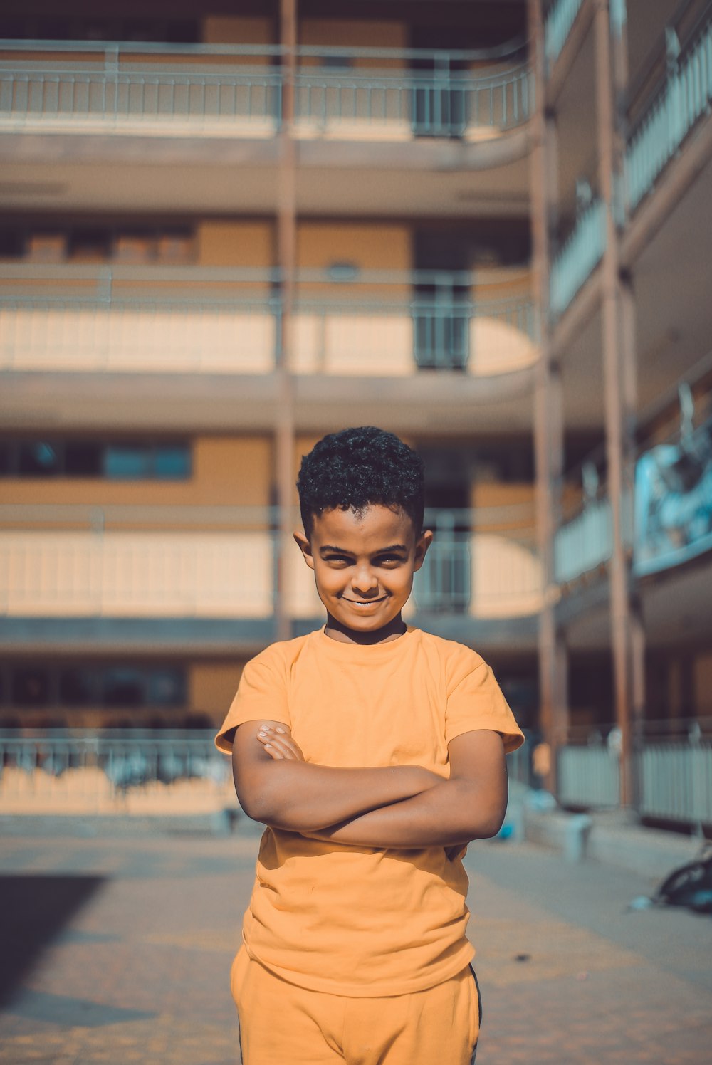 boy in yellow shirt