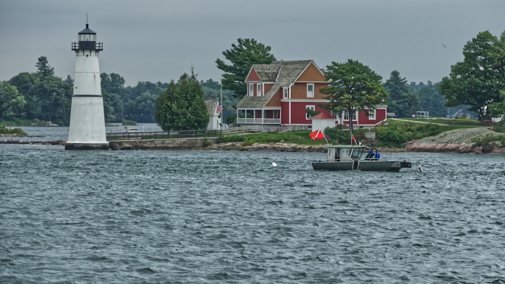 white lighthouse under gray sky