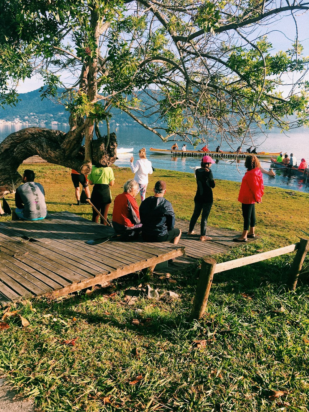 people near lake