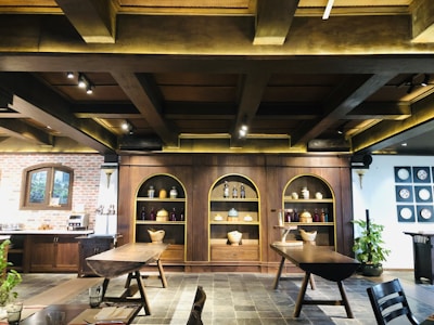 Artisan-crafted wooden cabinet with natural textures in a boutique hotel style room.